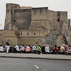 Napoli, Giugno 2010: Turisti Giapponesi ritraggono il Castel dell'Ovo.