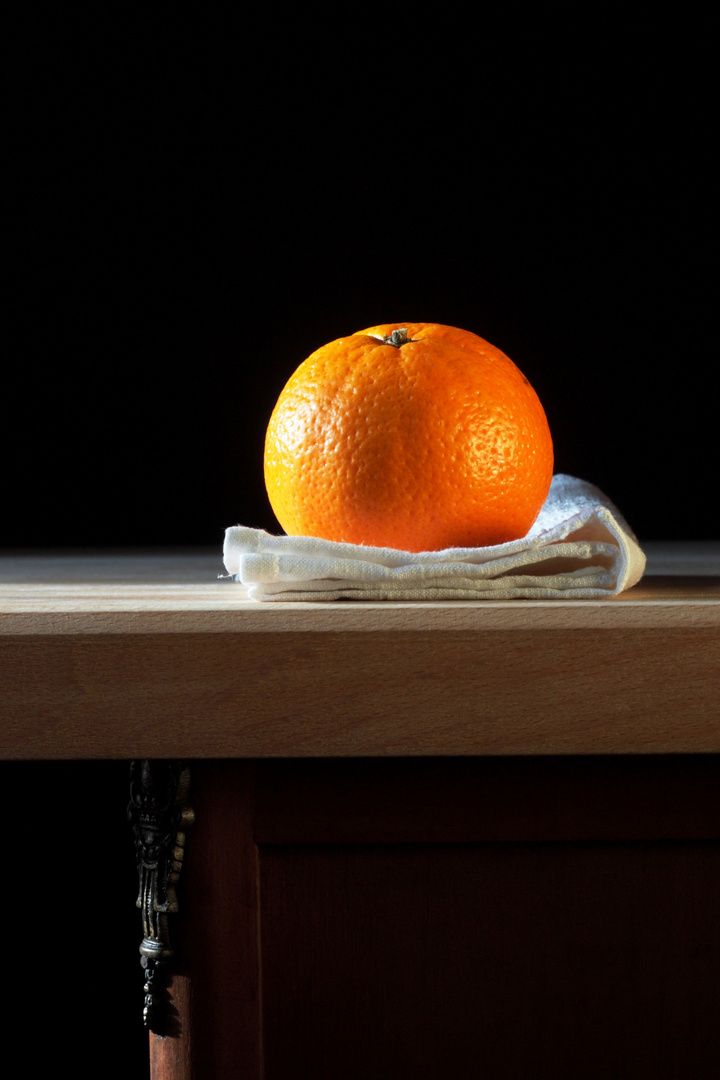 naranja sobre servilleta