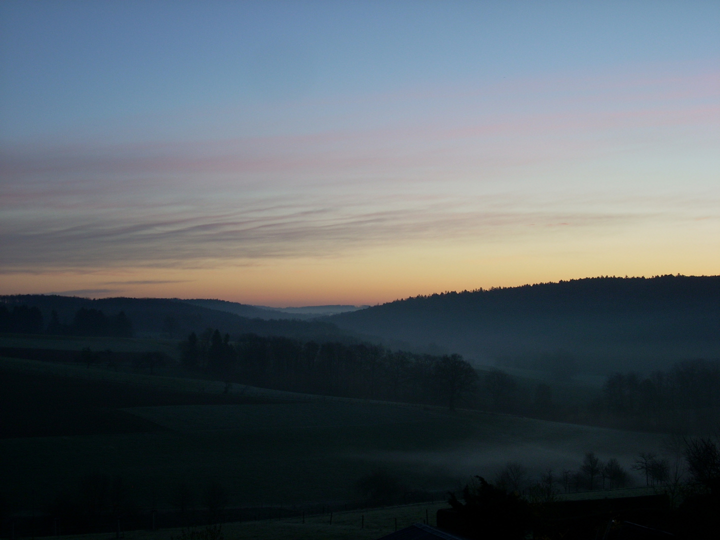 Nebel und Sonnenaufgang