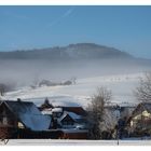 Nebel zieht aus dem Tal hinauf