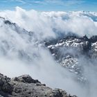 Nebelbänke über den Loferer Steinberge, im Hintergrund die Hohen Tauern