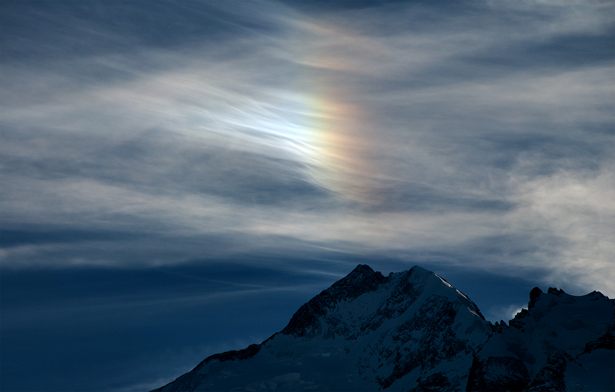 Nebensonne (Halo) über dem Piz Bernina