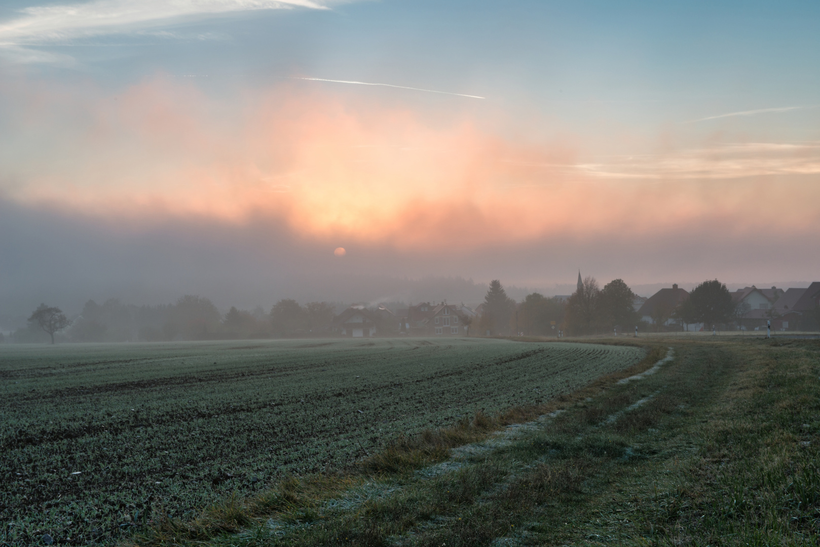 nebliger Sonnenaufgang