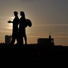 Neris Bridge: Sculptures at dusk