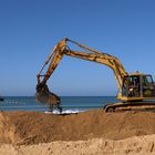 Neuer Sand braucht der Strand, nach den Winterstürmen wurde der Strand...