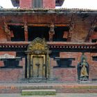 Newa man sitting at the door to the temple