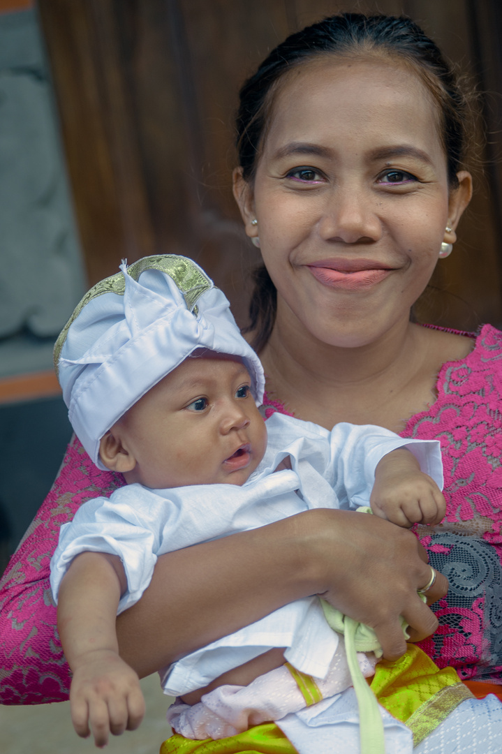 Ni Kadek Mayang Sari and her son Mayun