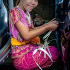 Ni Kadek Mayang Sari blessing the car