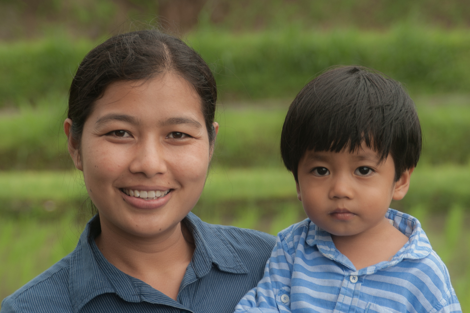 Ni Koming Indah and her son Aswin