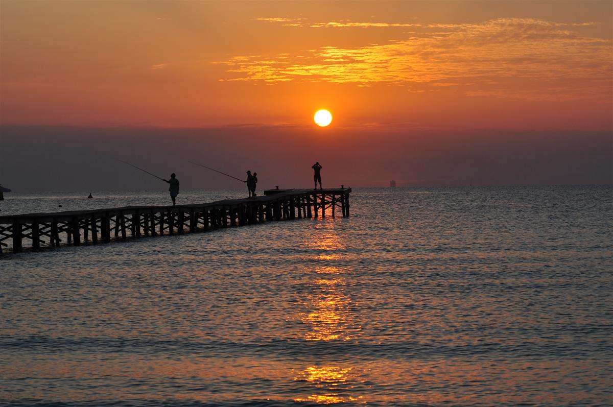 Nicht allein beim Sonnenaufgang in Alcudia