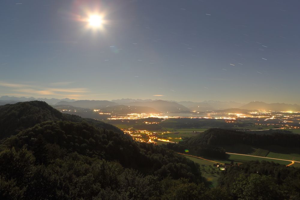 night view with moonshine and stars from Albispass on Zug and mountains (5 minutes exposure)