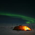 Nordlicht und Kerze als visueller Verstärker