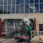 Nostalgic steam locomotive leaving the station