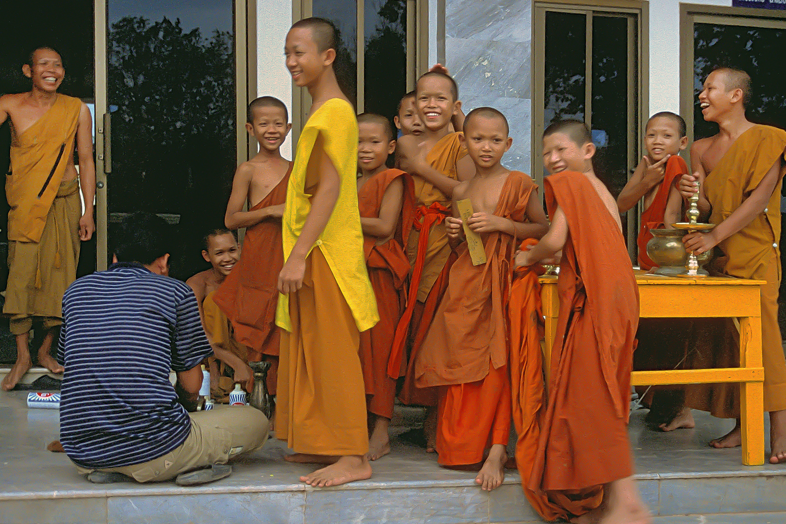 Novices in a monastery beside Mekong
