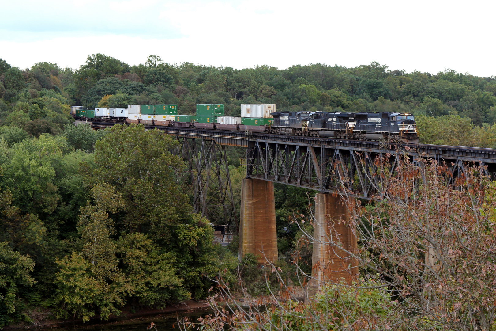 NS Double Stack Freight Train passing the Shepherdstown Railroad Bridge , WV, USA