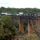 NS Double Stack Freight Train passing the Shepherdstown Railroad Bridge , WV, USA