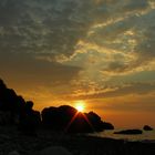 Nuvole al tramonto sulla spiaggia dell'Atelier.