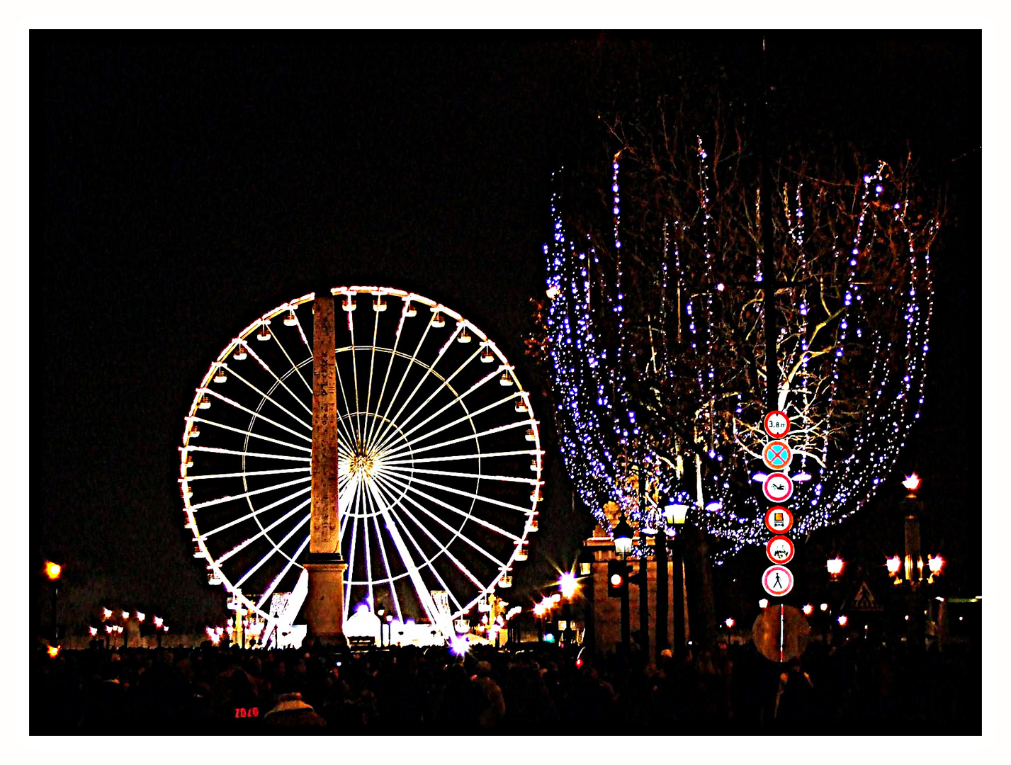 Obelisk und Riesenrad bei Nacht