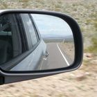 Objects in the rear view mirror may appear closer than they are ... Objects ??? What objects?
