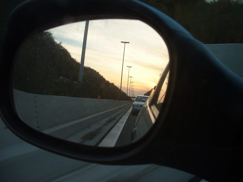 Objects in the rearview mirror may appear closer than they are....