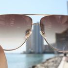 Observing Miami through sunglasses.