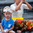 Odalan praying in the village