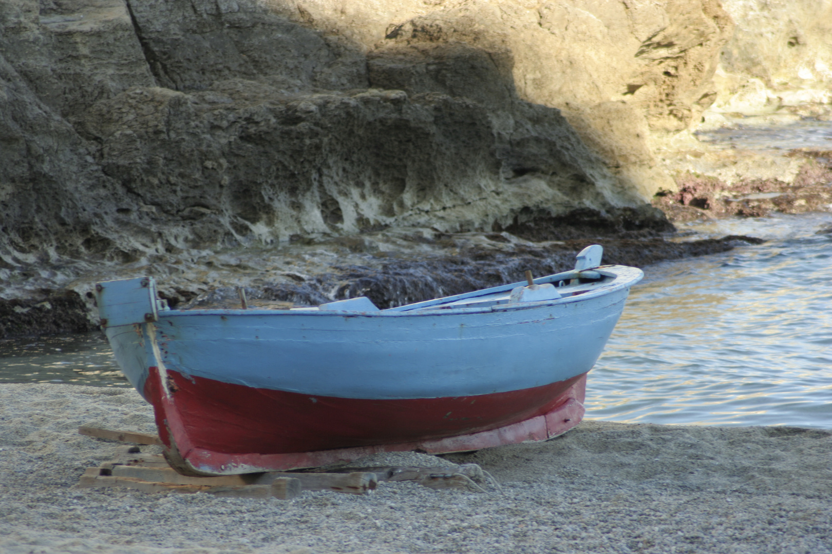 Old boat in blue and red