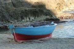 Old boat in blue and red