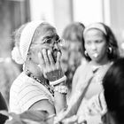 Old Cuban Lady listening to Salsa Band