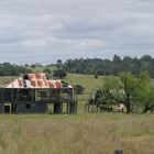  old damaged farm house and shed