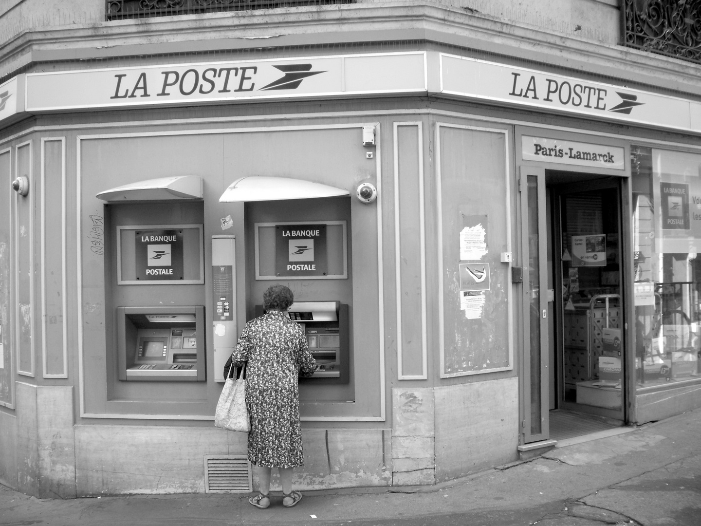 old lady using ATM