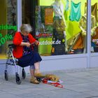 Old lady with dog in the City of Wiesbaden