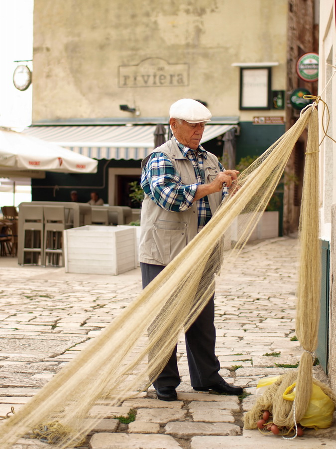 Old man and his net