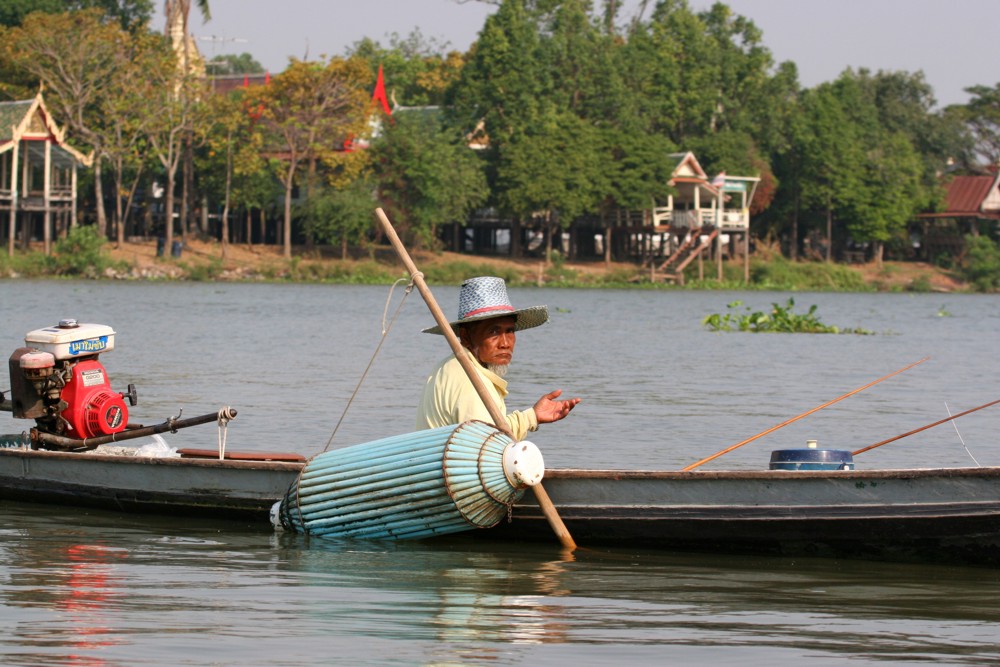 old man on river