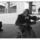 Old man playing violin