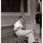 old man waiting for bus...