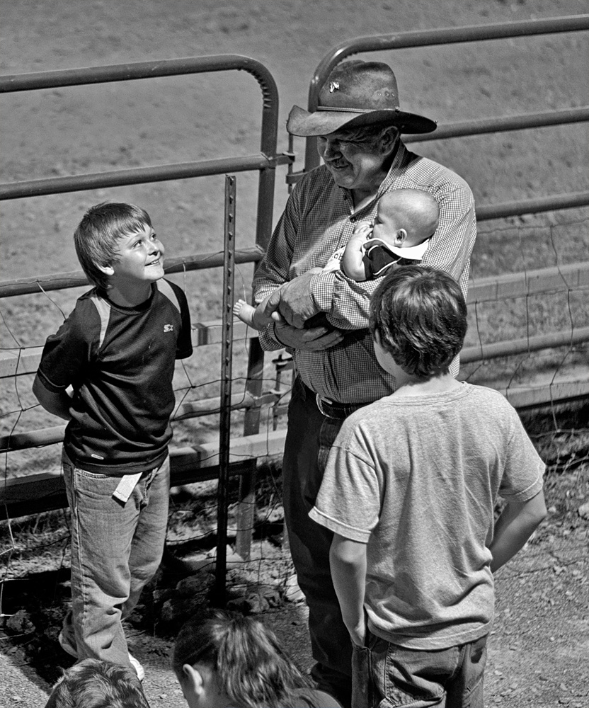 Old Rancher with Grandsons