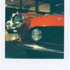 old red Ferrari / Polaroid SX70 - Impossible