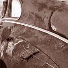 old rusty automobile on car graveyard