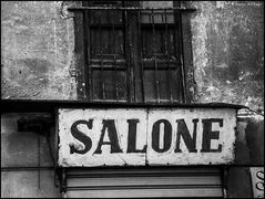 Old signboard of barbershop