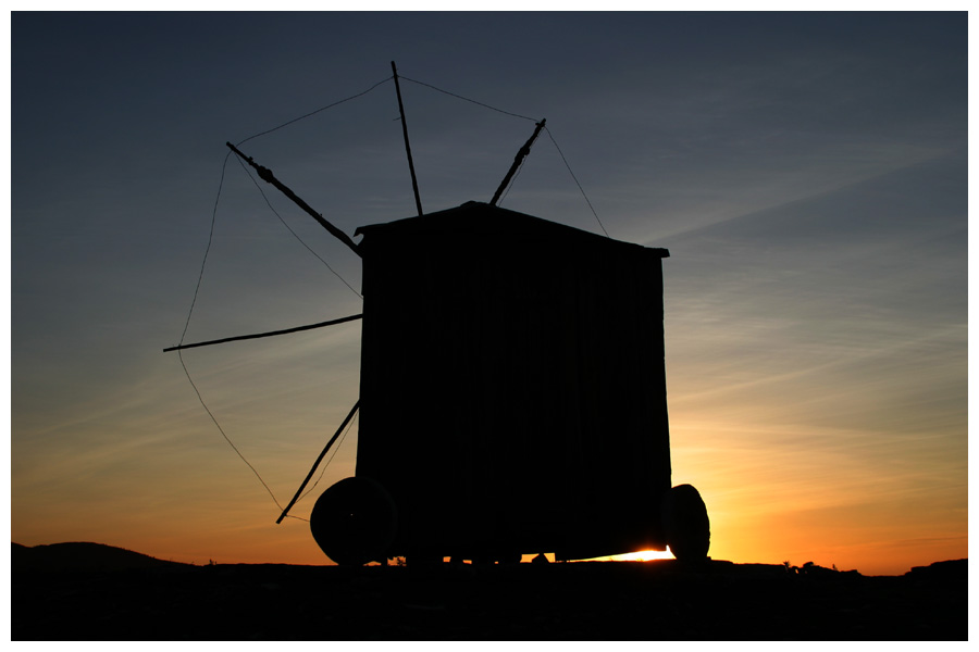 old wind mill, older sun