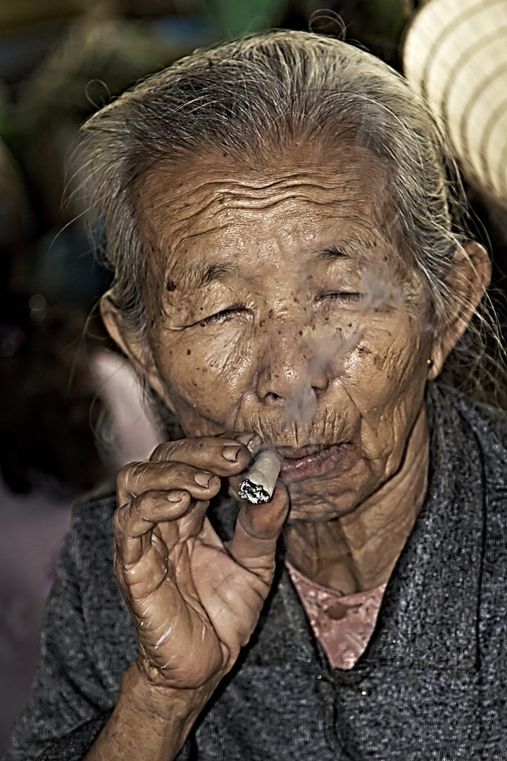 Old woman smoking