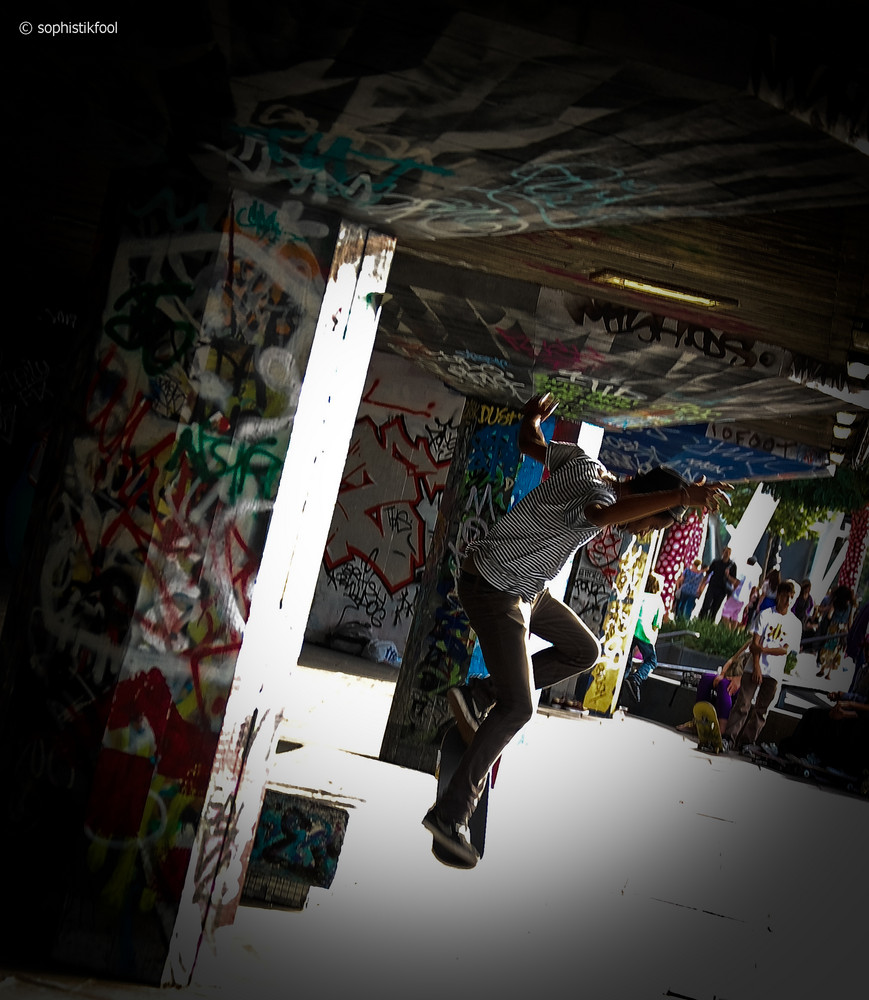 OLLIE THROUGH GRAFFITI