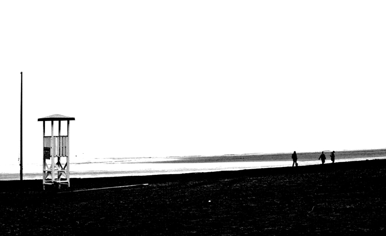 on the shore barefoot in winter