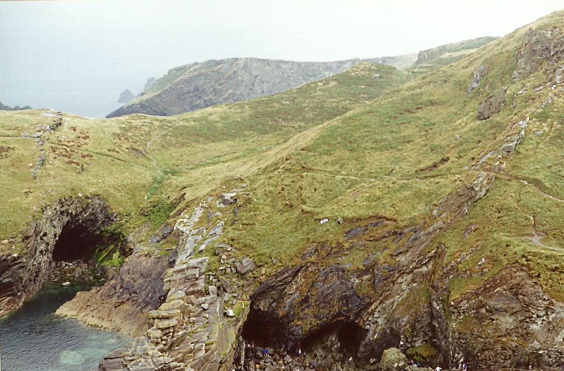 opposite Tintagel Castel ............ Merlin`s  Cave