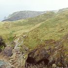 opposite Tintagel Castel ............ Merlin`s  Cave