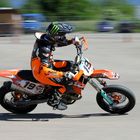 Orange-Black KTM in Action