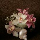 Orchids, sea shell and jade
