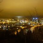 Oslo by night with Holmenkollen in the background