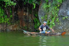 Other Bali Aga fisherman in his log-boat